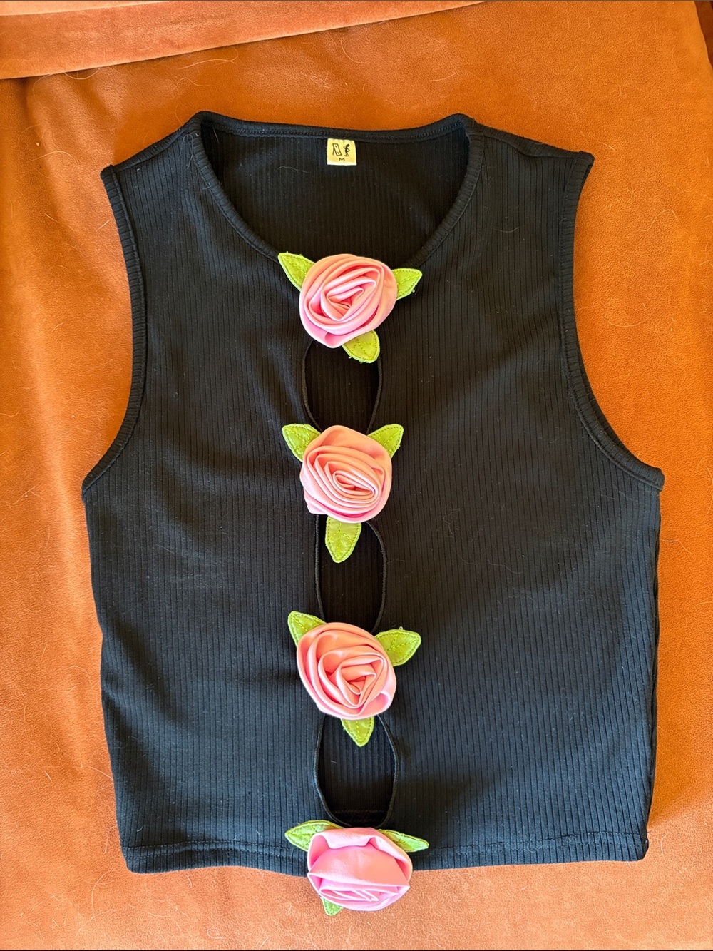 Fashion Brand Company -Black Sleeveless Ribbed Crop Top with Pink Floral Accents